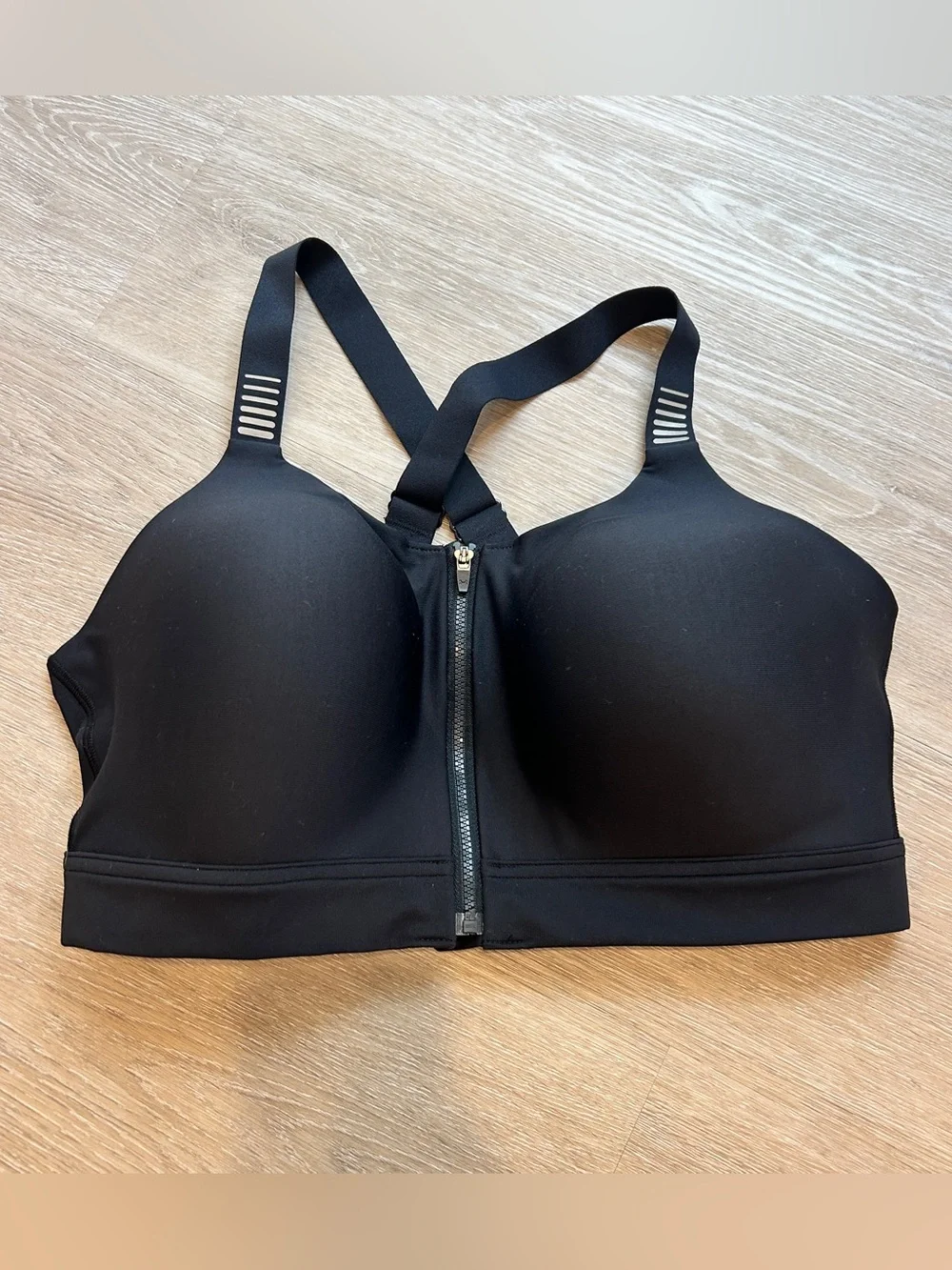 Under Armour black sports bra with zipper in size 38DD
